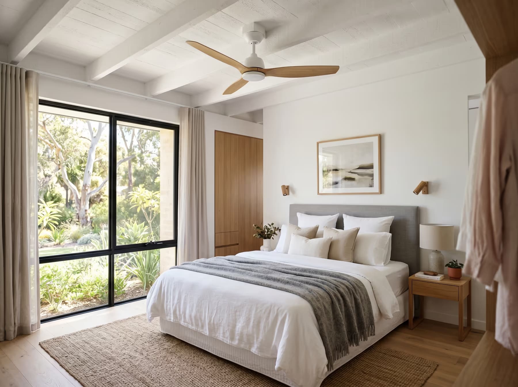Modern timber ceiling fan installed in a Perth bedroom