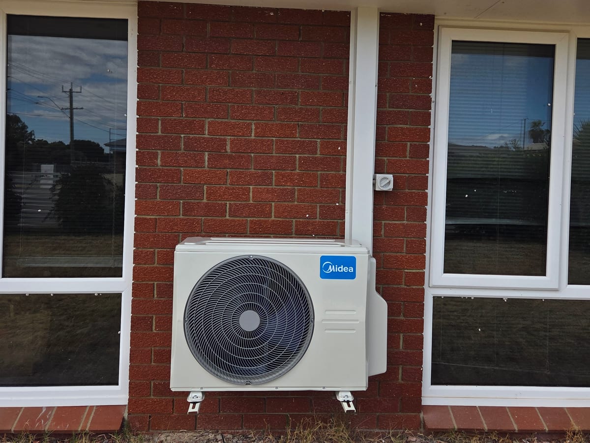 Midea outdoor unit installed on a Perth home by Otter Air