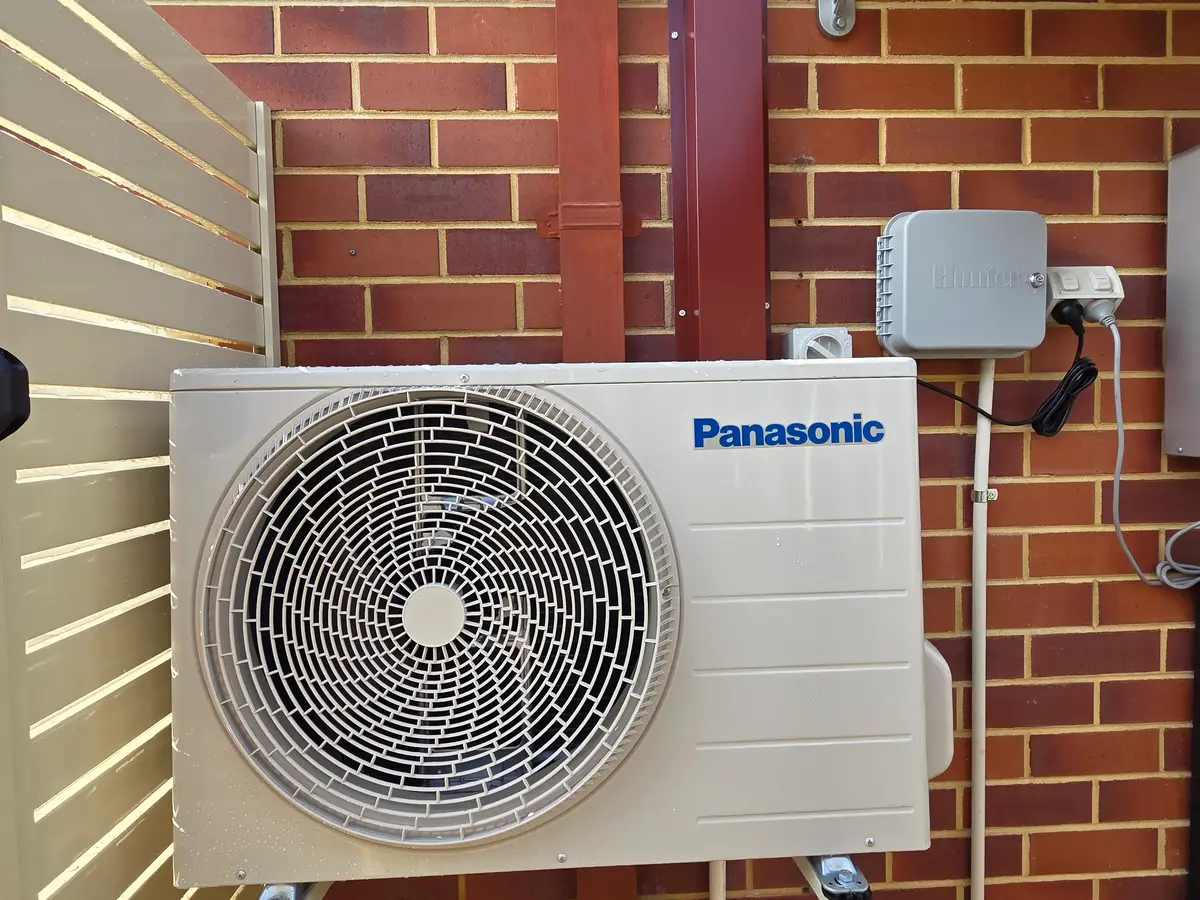 Panasonic split system outdoor unit neatly installed on a Perth home by Otter Air